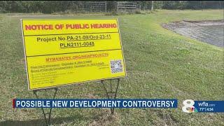 Racing community pushes back against proposed housing development near tracks