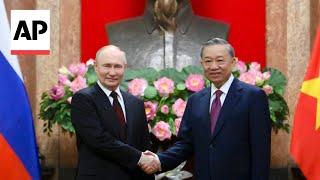 Russia's Vladimir Putin greeted by Vietnamese President To Lam