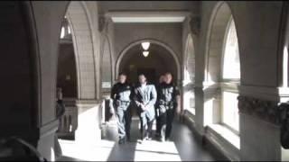 Richard A. Poplawski is led into court