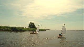 Sailing canoes at play