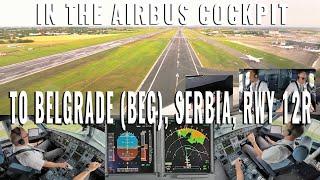 BELGRADE  (BEG)  APPROACH AND COCKPIT LANDING ON RUNWAY 12R AIRBUS 319 / REAL COCKPIT AND PILOTS!