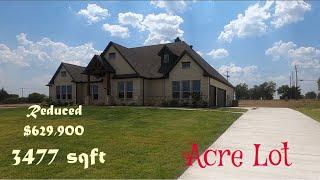 They reduced the price on this Sandlin Custom Home on an acre, should we get?