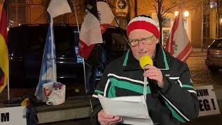 Greifswald - Rolf mit einem Flüchtlingsgedicht 10-03-2025