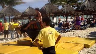 Tammy riding mechanical bull in Cancun