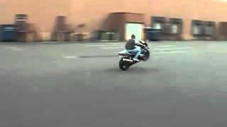 Person falls off motorcycle