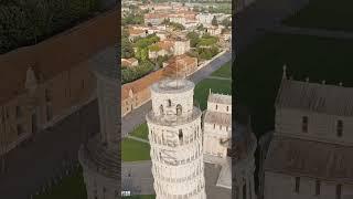 Vertical video. Pisa, Italy. Famous Leaning Tower and Pisa Cathedral in Piazza dei Miracoli. Summ...