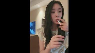 Chinese girl FANFAN smoking & chatting with fans at home 200