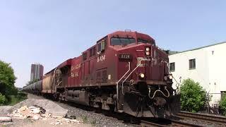 (CPKC) CP 528 with KCS 4190 rear DPU passing Bartlett