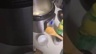 Hot Dominican girl making some Dominican style mussels in a steam pot in Paloma's Dominican Kitchen.