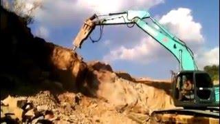 EXCAVATOR KOBELCO SK200-8 WITH STONES BREAKER