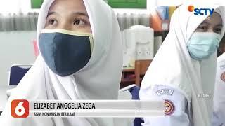 SISWI NON MUSLIM TAK MERASA TERPAKSA MENGENAKAN SERAGAM JILBAB