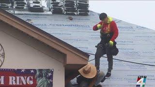 Local roofing companies come together to give disabled veteran a new roof for the holidays