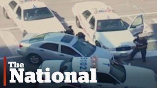 Toronto police open fire on car