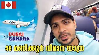 48 hours Fly ! Dubai to Canada  on Ajet | Mallu traveler