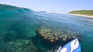 Surfing Paradise at Nyang Nyang Beach: Glassy Waves and Underwater Wonders!