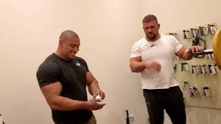 Grip feats with Kirill Sarychev. Lifting 98 KG Inch dumbbell.