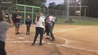 Military homecoming: Father surprises daughter at Buford softball game