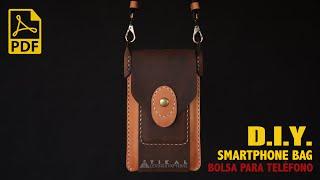 Making a leather phone bag with front and back pocket. PDF pattern available.