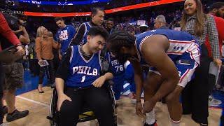 James Harden shares a moment with John Hao after game winner vs Celtics