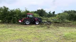 Tym T754 Extreme Brush Cutter eating threw thick over growth no problem