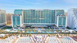 HILTON Dubai Palm Jumeirah Hotel | BEACHFRONT Resort (full tour) 4K