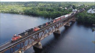 Awesome Aerial 4K View! Long Freight Train CN 305 w/DPU Crossing Bridge at Chipman, NB