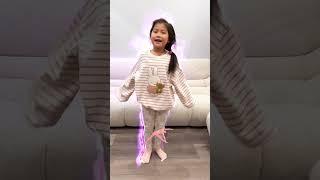 Elena’s ready to shine  Showing off her exercise skills with jumping jacks, push-ups, and stretches