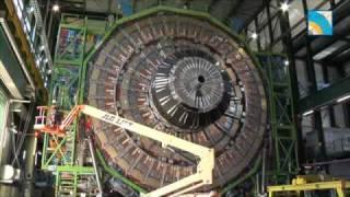 The experiments of the LHC  ALICE ATLAS CMS LHCb and the GRID .flv