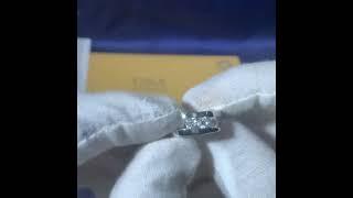 ROUND CUT THREE STONES MOISSANITE ENGAGEMENT RING by Evani Naomi Jewelry