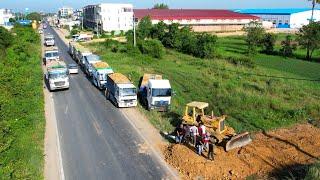 Wonderful stronger Heavy Bulldozer KOMATSU D58P working push with Dump truck unloading stone filling