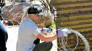 ‘Border Vets’ install razor wire at U.S.-Mexico border wall in Jacumba