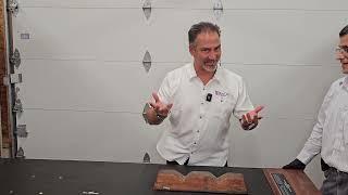 Hefting a copper ingot at the A.E. Seaman Mineral Museum in Houghton, Michigan