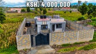 A KENYAN RETURNEE COUPLE BUILT KSH. 4,000,000 3-BEDROOM FLAT ROOFED BUNGALOW FOR THEIR MUM