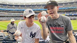 Zack Hample helping a kid catch baseballs at Yankee Stadium