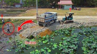 Perfectly start a new project! Pour the stones into the water,Dozer KOMATSU and Dump truck Unloading