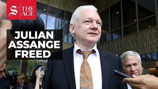 Julian Assange walks out of court a free man after guilty plea