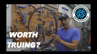 Should You Fix This Warped Bicycle Wheel Or Is It Beyond Repair? I will show you.