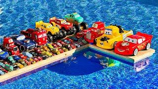 Disney Pixar Cars falling into deep pool, Lightning McQueen, Tow Mater, Mack, Sally, Francesco