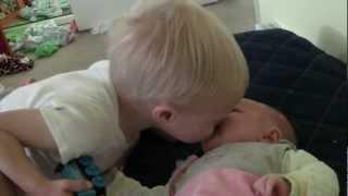 Baby Micah Giving Sister Ruby a Kiss