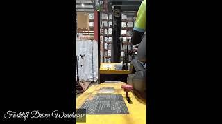 drive a forklift in a warehouse