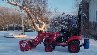 TYM T224 with 54" snow pusher Bigfoot pushing some fresh snow