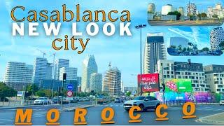 The city of Casablanca in a new look in 2024 |  Morocco  Driving downtown | person walking