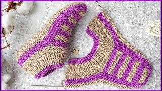 Home footprints with knitting needles. Simple slippers with no seams on the sole.