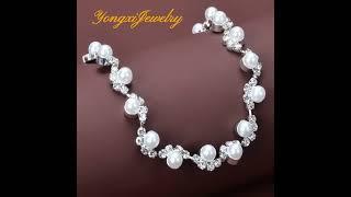 Discover elegance redefined with Yongxi Jewelry’s charming Rhinestones Pearl Bracelet!