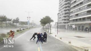 Thousands Evacuated as Powerful Typhoon Slams Into Southern China | WSJ News