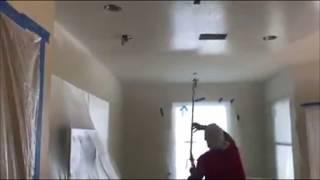 Spray painting interior ceilings with Eminence ceiling paint