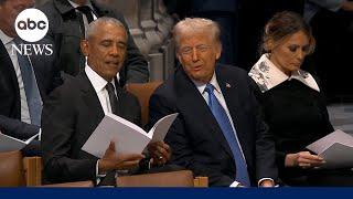 Obama, Trump sit together, talk before Jimmy Carter funeral