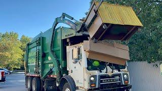 WM Front Load Garbage Truck Dumping Overloaded Recycling Dumpsters