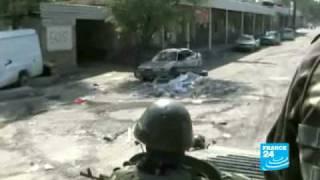 Kyrgyzstan - Uzbekistan:- Army takes down barricades in burnt-out Osh