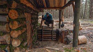 Tiny log cabin in the woods half-underground, cozy dugout shelter building, no talking